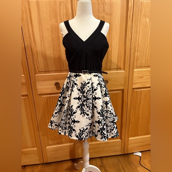 Crystal Doll Black and White Fit and Flare
Dress - Picture 1 of 16